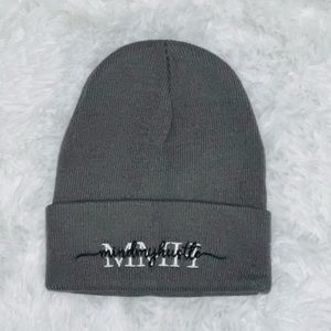 Custom Gray beanie from small business “MindMyHustle”.